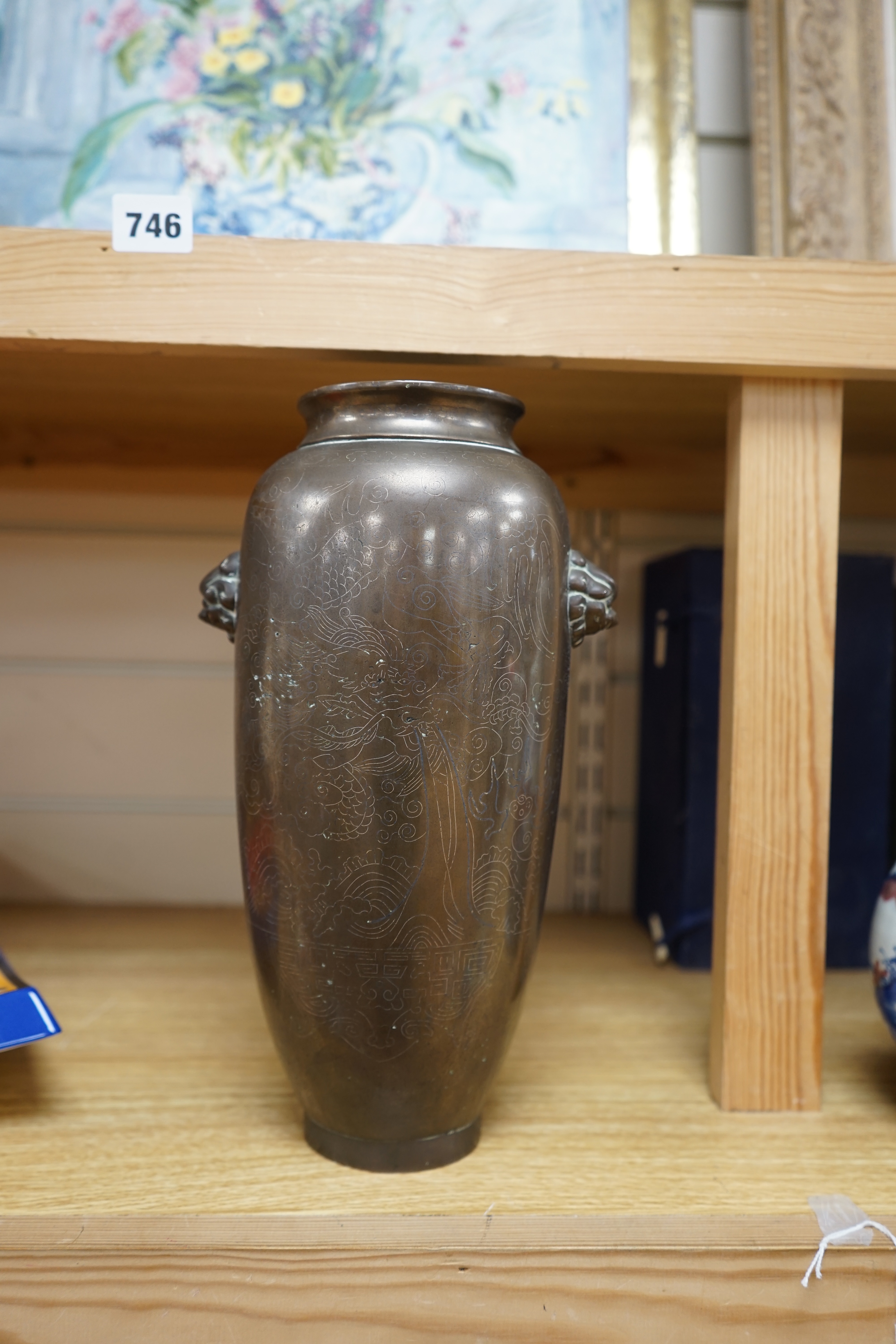 A tall 19th century Chinese silver inlaid bronze twin handled vase, signed ‘Shisou’ to the base, 30cm high. Condition - fair to good